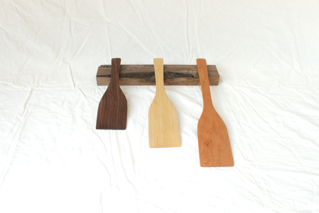 Wide cooking spatulas made for flipping pancakes and outdoor cooking. Three sizes. Hand crafted by an artisan in Upsatate New York. Three size: 9" walnut, 11" maple and 13" cherry. Each one is 2.5" wide.