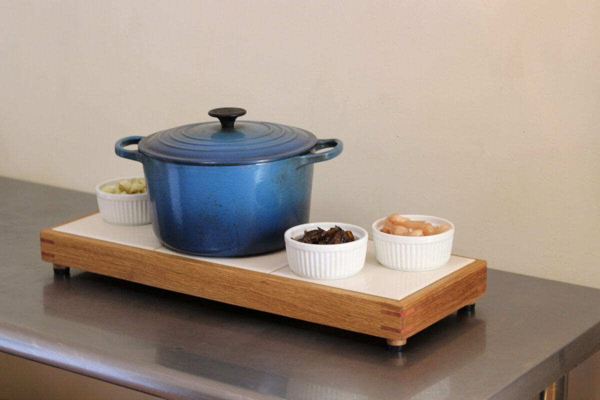 custom trivet using cast-off tiles and salvaged oak, with cedar splines for structure and decoration Eco-friendly wood and tile trivet made from upcycled materials. Handmade in Wawarsing, New York.
