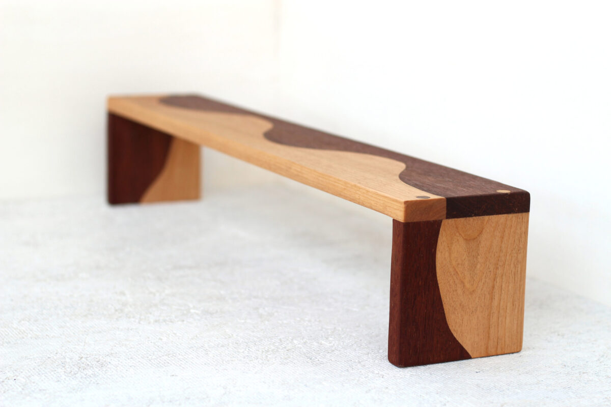 yin-yang tabletop shelf made from walnut and maple Artisanal countertop organizer shelf made by local upstate artisan. Walnut and Maple contrast in a yin-yang pattern to make a beautiful bespoke addition to any kitchen.